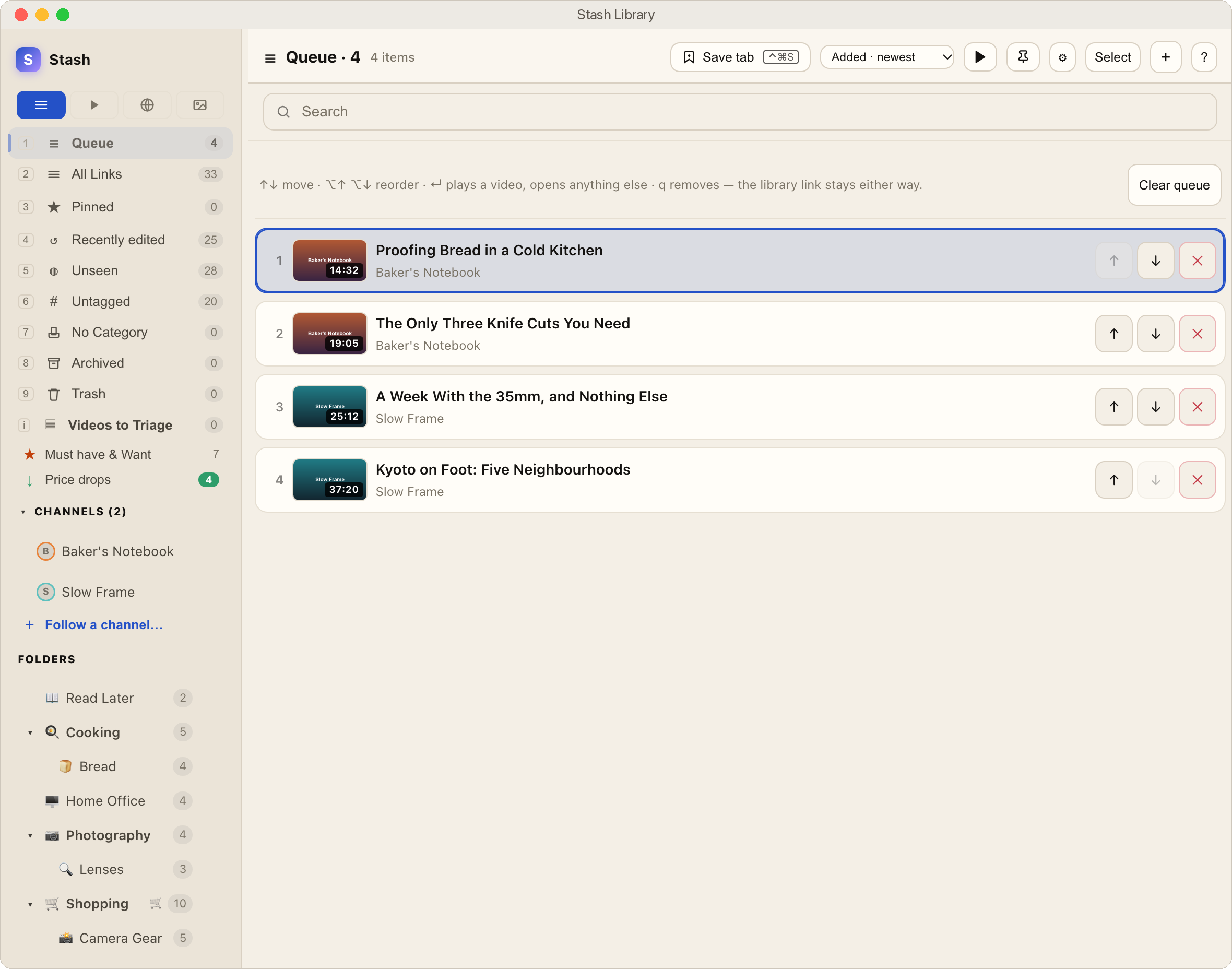 The play queue in Stash: four videos in order with their lengths, arrows to move each one, and a line of keyboard shortcuts above the list